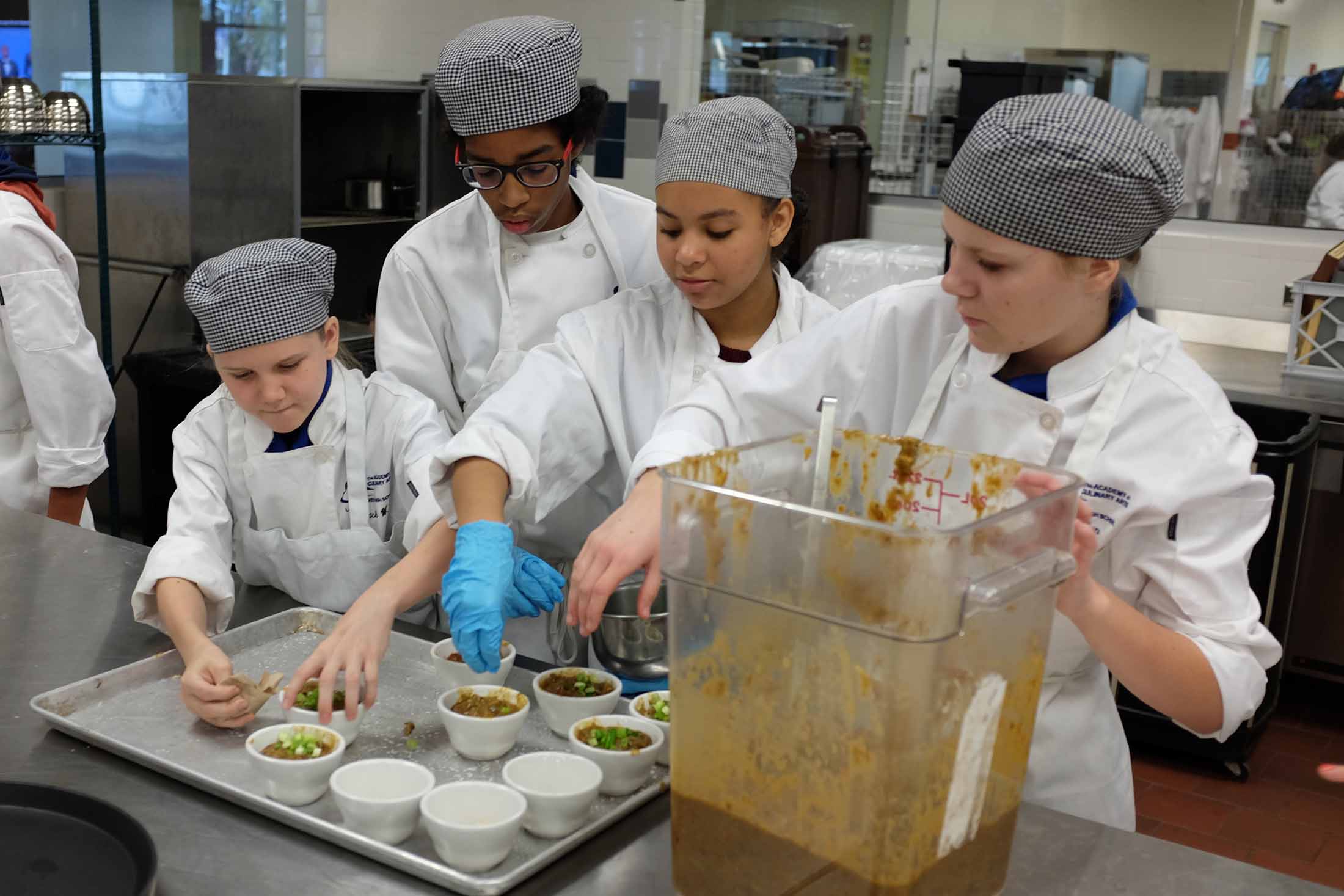 student doing food service